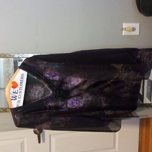 A dark purple with stones on the front